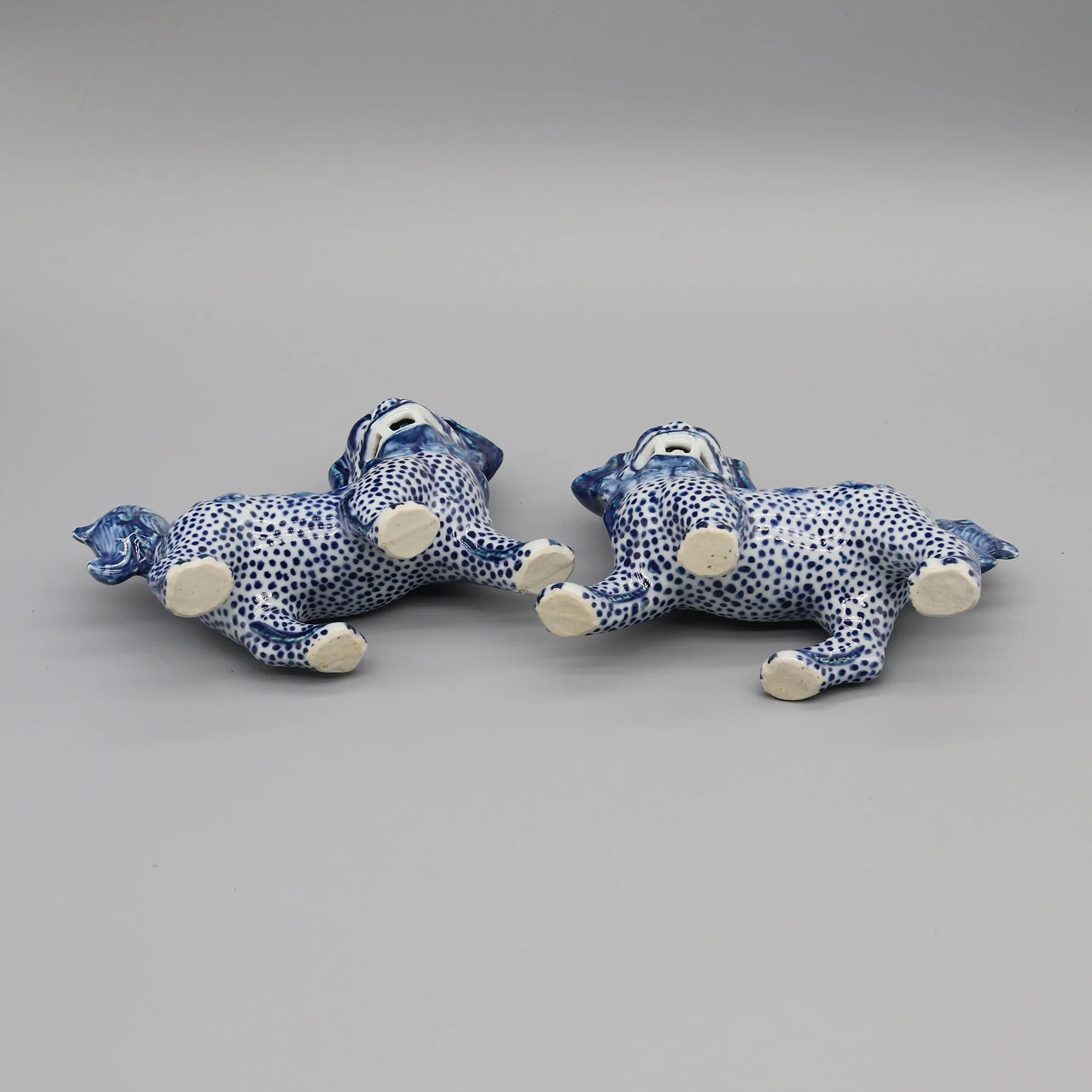 Pair of Blue & White Ceramic Walking Lion Statues - Image 9